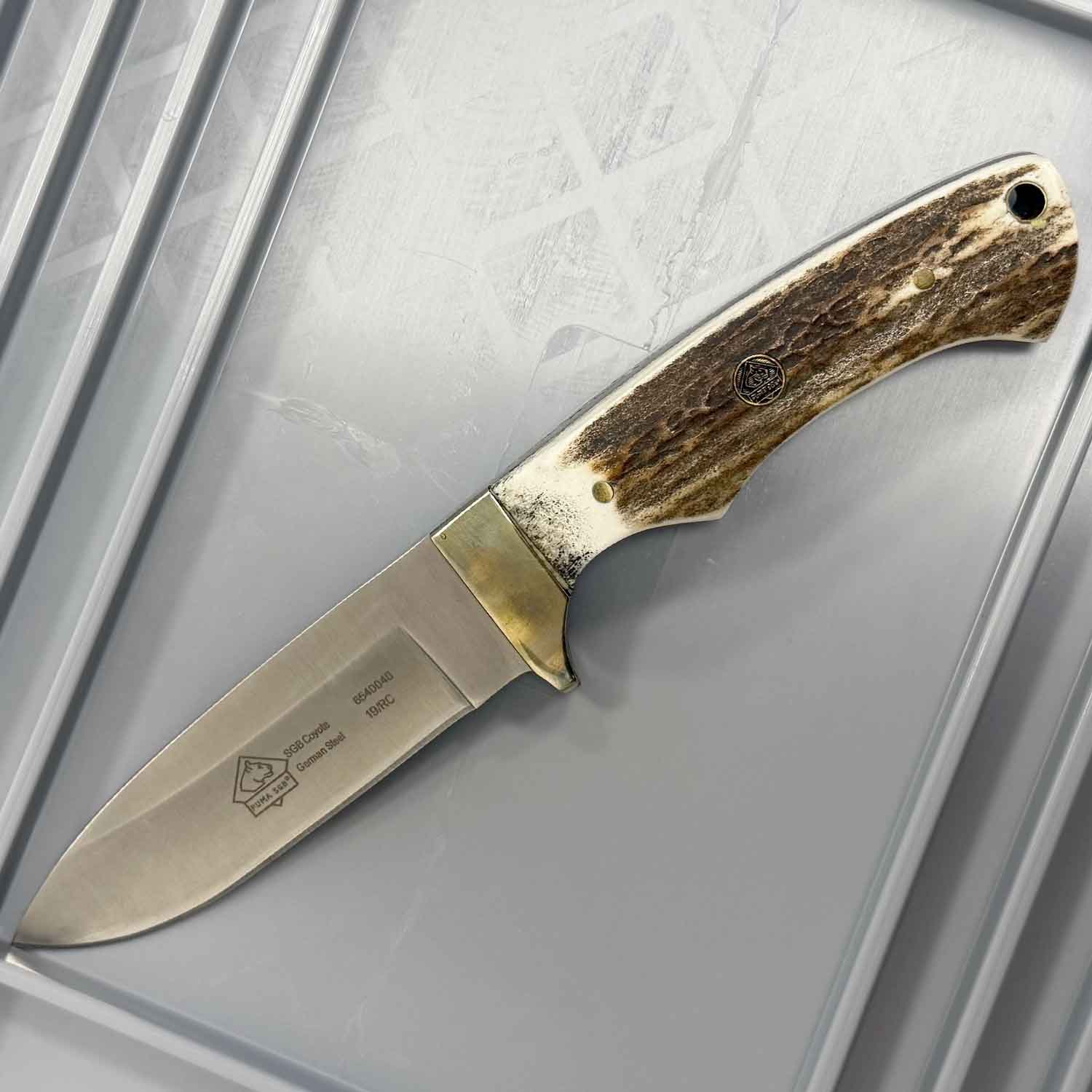 Puma SGB Coyote Stag - Outdoor Messer mit Hirschhorn Griffschalen & handgenähter Lederscheide