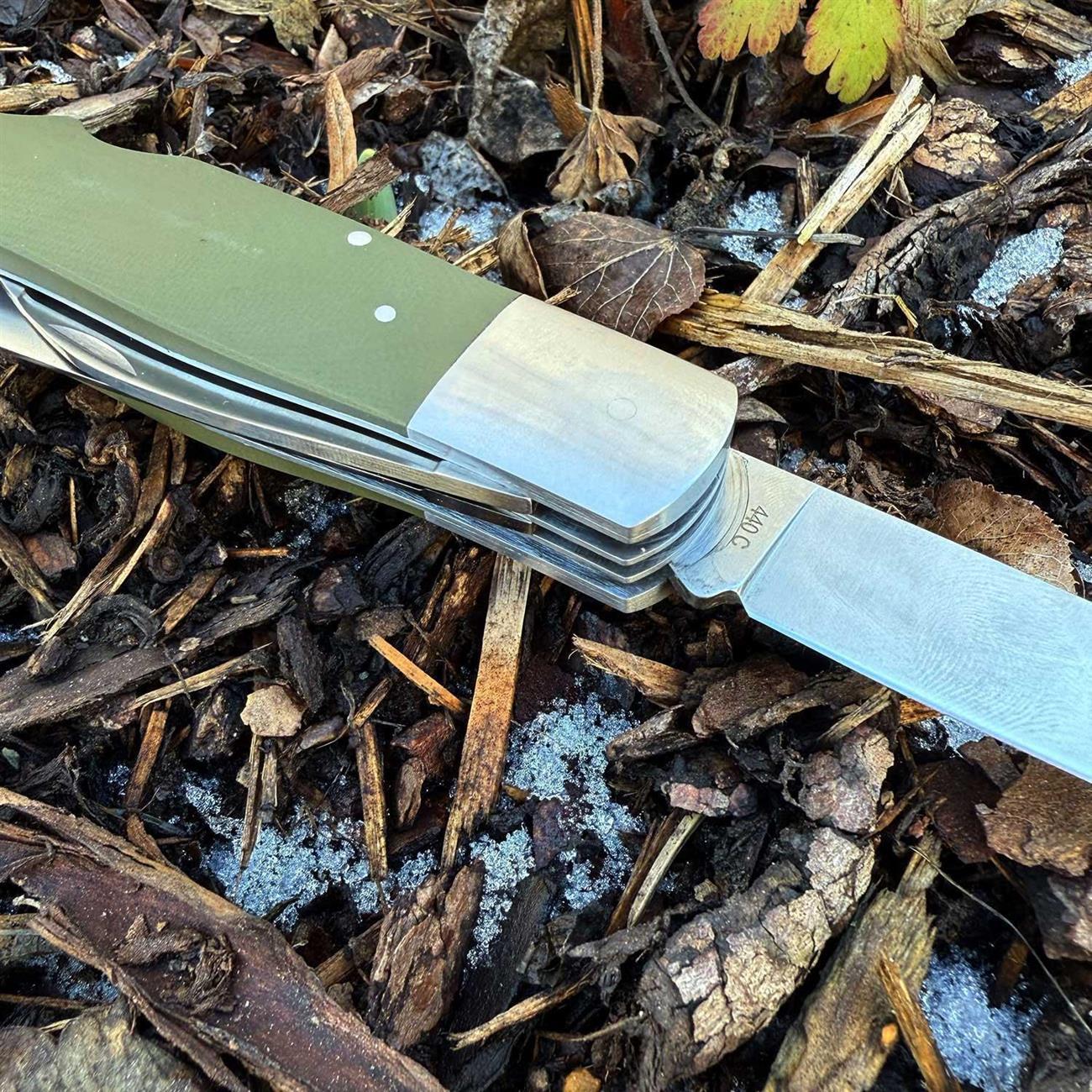 Puma TEC Jagdtaschenmesser mit Säge und Aufbrechklinge inkl. Lederetui – Farbvariante grün, Klinge und Schneide